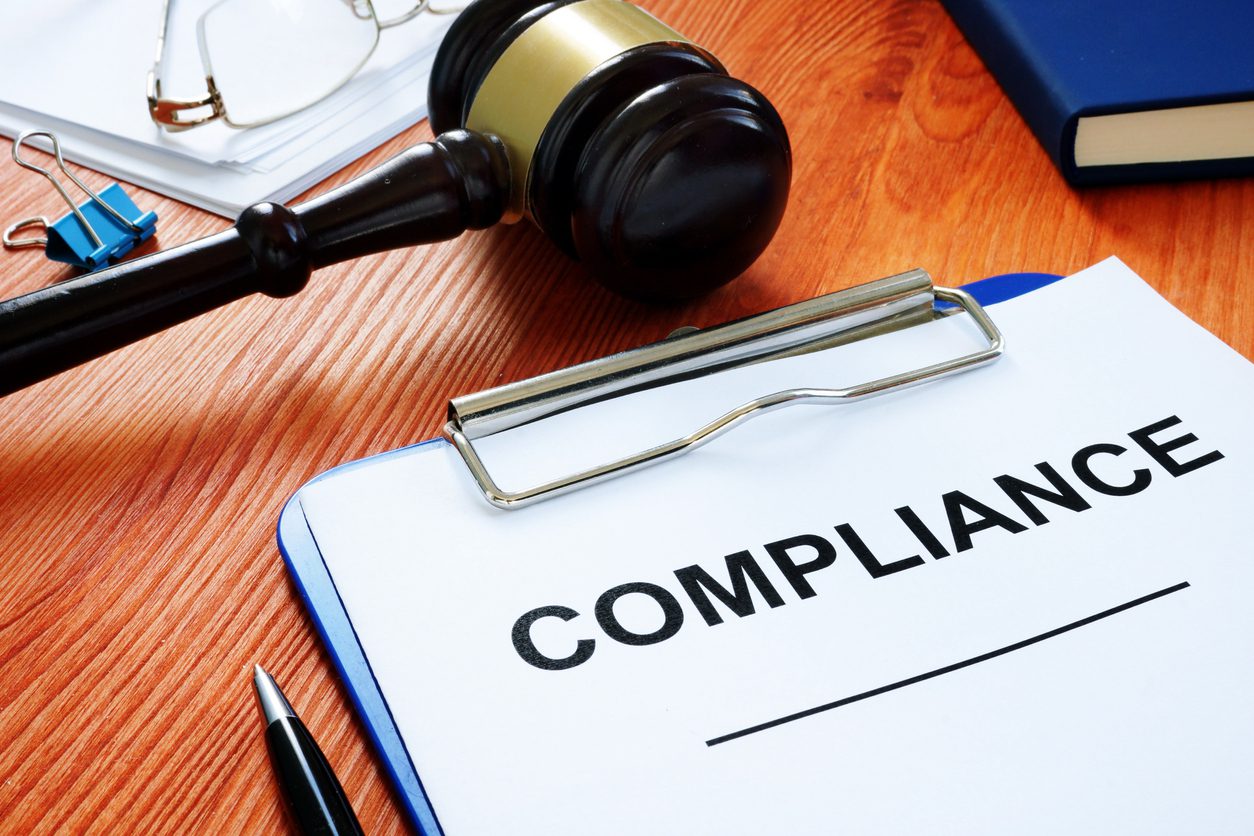 Compliance form and gavel in the court. a data catalog is not a compliance solution