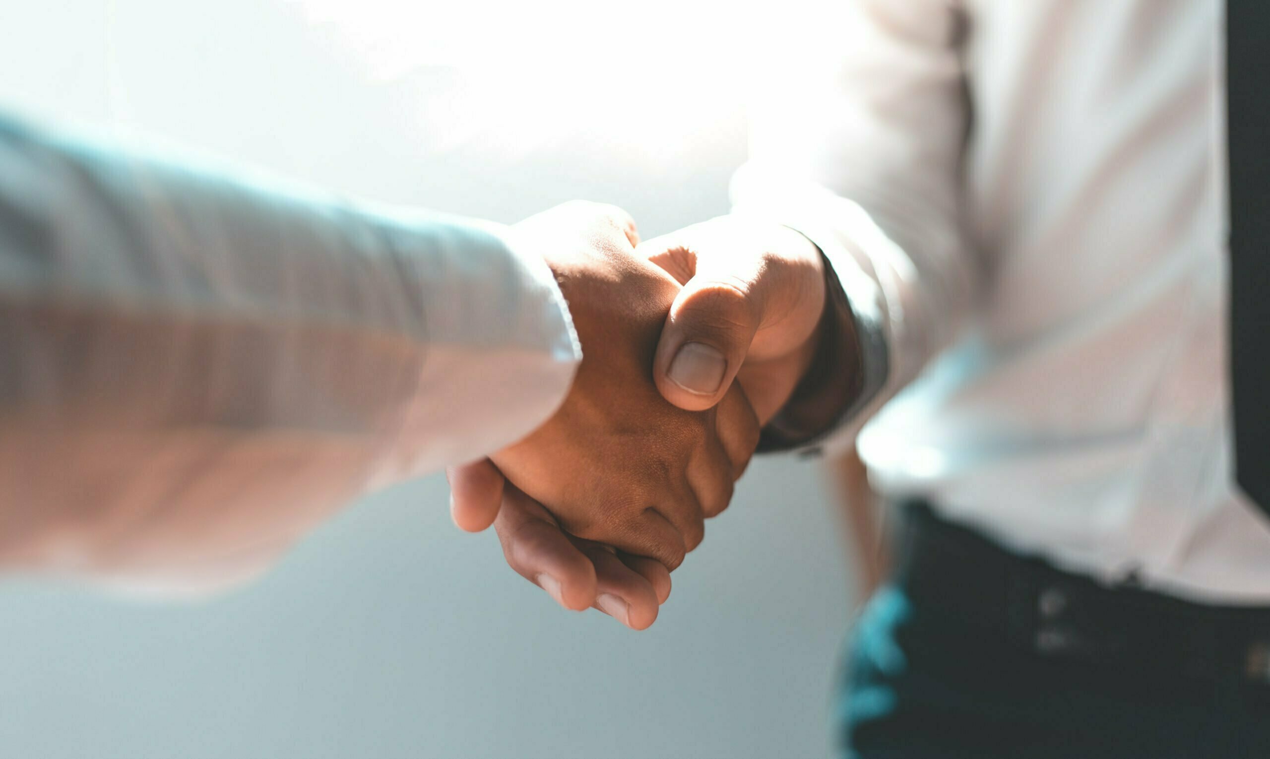 Men And Women Negotiate To Congratulate A Successful Business ,shaking Hands Concept. Men And Women Negotiate To Congratulate A Successful Business ,shaking Hands Concept.