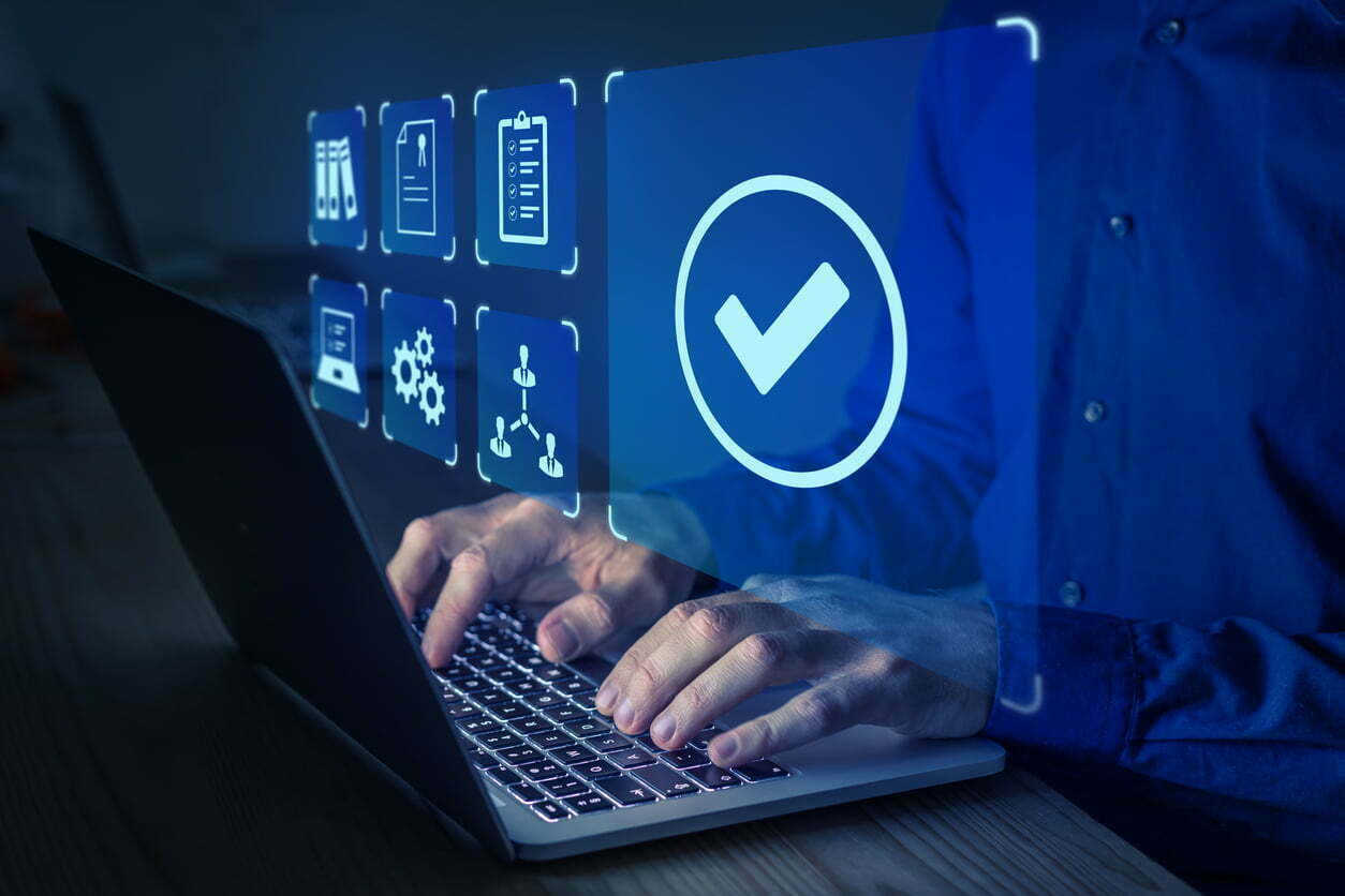 Quality Management With Qa (assurance), Qc (control) And Improvement. Standardisation And Certification Concept. Compliance To Regulations And Standards. Manager Or Auditor Working On Computer. Quality Management With Qa (assurance), Qc (control) And Improvement. Standardisation And Certification Concept. Compliance To Regulations And Standards. Manager Or Auditor Working On Computer.