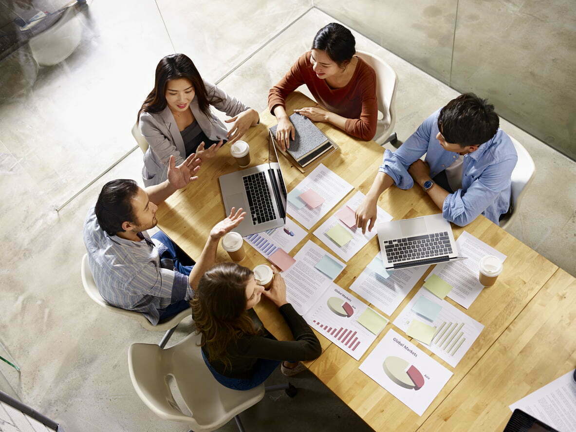 Multiethnic Business Team Meeting In Office Multiethnic Business Team Meeting In Office
