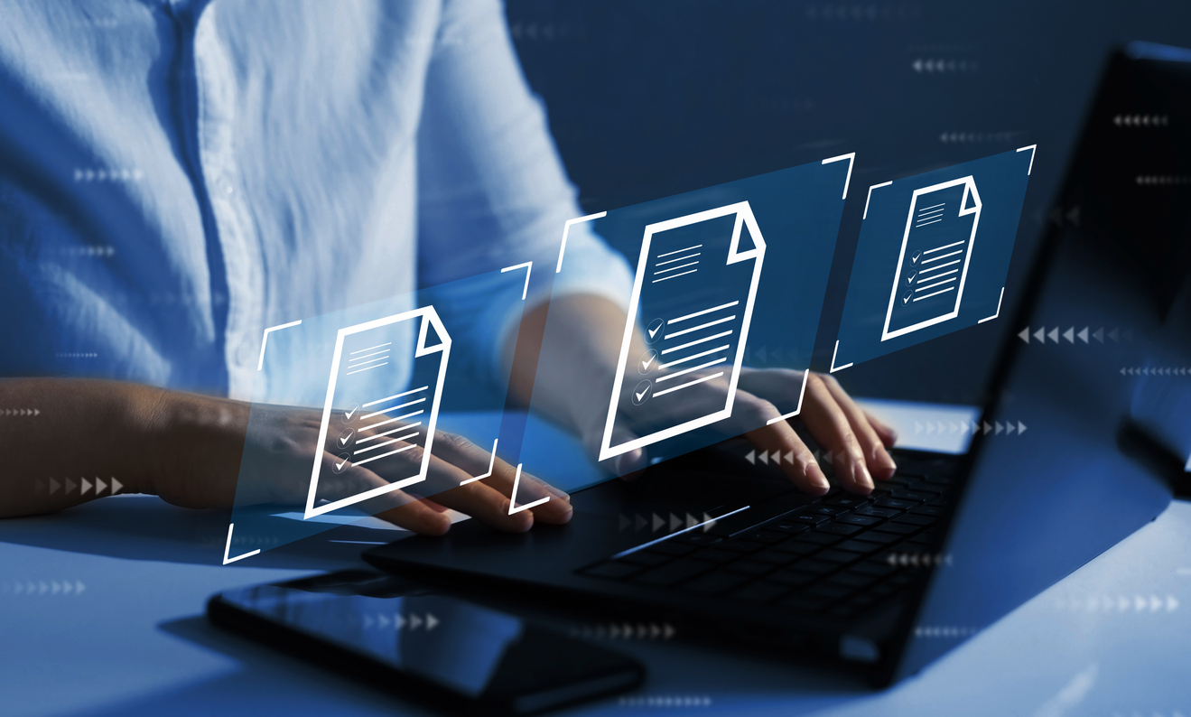 Businessman Working On Laptop With Virtual Screen. Process Automation To Efficiently Manage Files.online Documentation Database And Document Management System Concept. Businessman Working On Laptop With Virtual Screen. Process Automation To Efficiently Manage Files.online Documentation Database And Document Management System Concept.